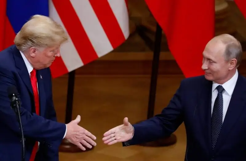 Trump shaking hands with Putin