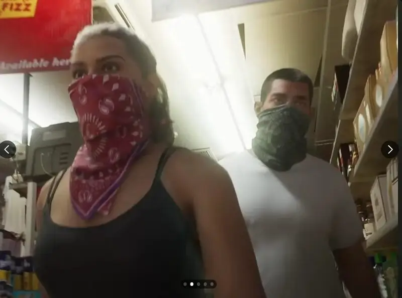 Lucia and Jason with guns during what appears to be a store robbery