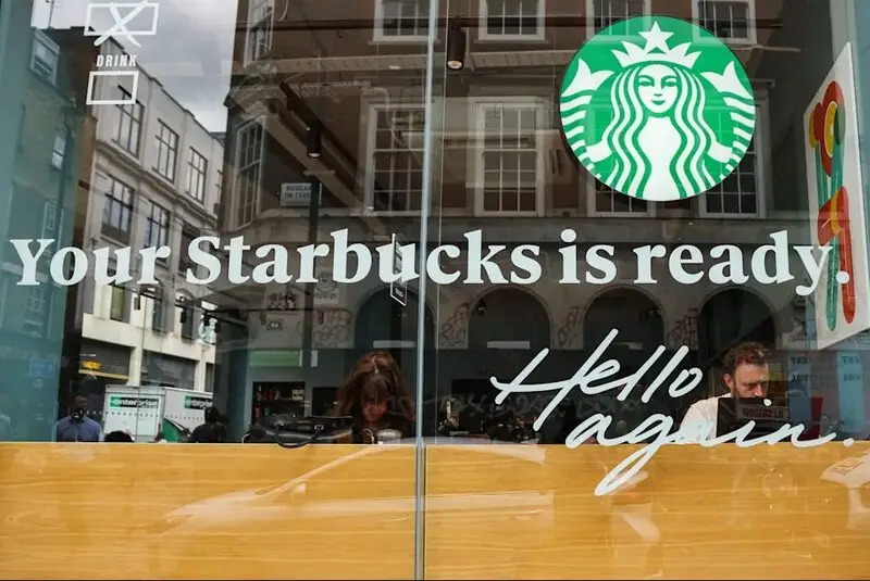 Starbucks logo with slogan