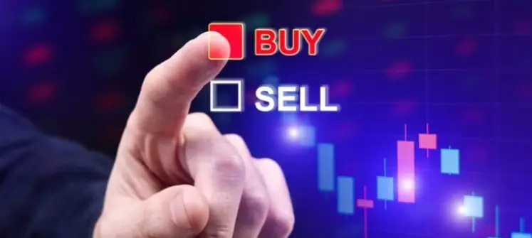Close-up of a person's hand selecting the "BUY" option in red over the "SELL" option in white