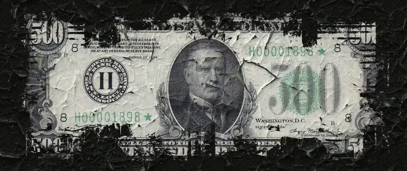 Tattered usd bill